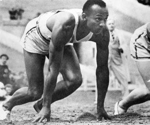 Olympic-sprinter-Jesse-Owens-awaits-the-start-of-a-race-at-the-1936-Olympic-Games-in-Germany.-300x250