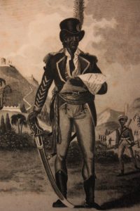 Toussaint Louverture, 1743-1803. O Toussaint ήταν γιος μορφωμένων σκλάβων, αποκτώντας έτσι αλλά και μέσω Ιησουϊτών γνώσεις Γαλλικών. Στην αρχή η εξέγερση τον άφησε αδιάφορο, αλλά σύντομα διέκρινε την ανικανότητα των ηγετών των ανταρτών. Όταν τελικά συντάχθηκε με τους εξεγερμένους, η αναρρίχηση του στην ιεραρχία τους ήταν αλματώδης και οι ηγετικές του ικανότητες αδιαμφισβήτητες, κερδίζοντας το προσωνύμιο ''Μαύρος Σπάρτακος''.